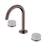An image of Nero Tapware's Serenity Basin Set Arc Spout With Carrara Handle Brushed Bronze