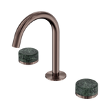 An image of Nero Tapware's Serenity Basin Set Arc Spout With Verde Alpi Handle Brushed Bronze