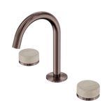 An image of Nero Tapware's Serenity Basin Set Arc Spout With Rome Travertine Handle Brushed Bronze