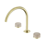 An image of Nero Tapware's Serenity Bath/Kitchen Set Arc Spout With Rome Travertine Handle Brushed Gold