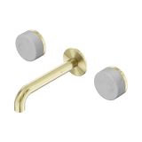 An image of Nero Tapware's Serenity Wall Basin Set 160mm Spout With Carrara Handle Brushed Gold