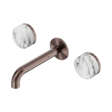 An image of Nero Tapware's Serenity Wall Basin Set 160mm Spout With Arabescato Corchia Handle Brushed Bronze