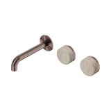 An image of Nero Tapware's Serenity Wall Basin Set 160mm Offset Spout With Rome Travertine Handle Brushed Bronze