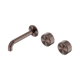 An image of Nero Tapware's Serenity Wall Basin Set 160mm Offset Spout With Metal Handle Brushed Bronze