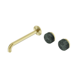 An image of Nero Tapware's Serenity Wall Basin Set 220mm Offset Spout With Verde Alpi Handle Brushed Gold