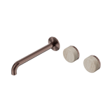 An image of Nero Tapware's Serenity Wall Basin Set 220mm Offset Spout With Rome Travertine Handle Brushed Bronze