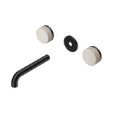 An image of Nero Tapware's Serenity Wall Basin Set 160mm Spout With Rome Travertine Handle Trim Kit Only Matt Black