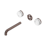An image of Nero Tapware's Serenity Wall Basin Set 185mm Spout With Arabescato Corchia Handle Trim Kit Only Brushed Bronze
