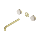 An image of Nero Tapware's Serenity Wall Basin Set 220mm Spout With Rome Travertine Handle Trim Kit Only Brushed Gold