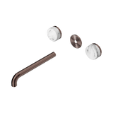 An image of Nero Tapware's Serenity Wall Basin Set 220mm Spout With Arabescato Corchia Handle Trim Kit Only Brushed Bronze
