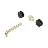 An image of Nero Tapware's Serenity Wall Basin Set 185mm Spout With Marquina Black Handle Trim Kit Only Brushed Gold