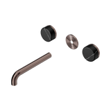 An image of Nero Tapware's Serenity Wall Basin Set 185mm Spout With Marquina Black Handle Trim Kit Only Brushed Bronze