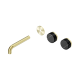 An image of Nero Tapware's Serenity Wall Basin Set 160mm Offset Spout With Marquina Black Handle Trim Kit Only Brushed Gold