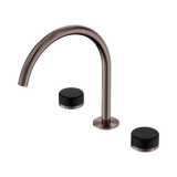 An image of Nero Tapware's Serenity Bath/Kitchen Set Arc Spout With Marquina Black Handle Brushed Bronze