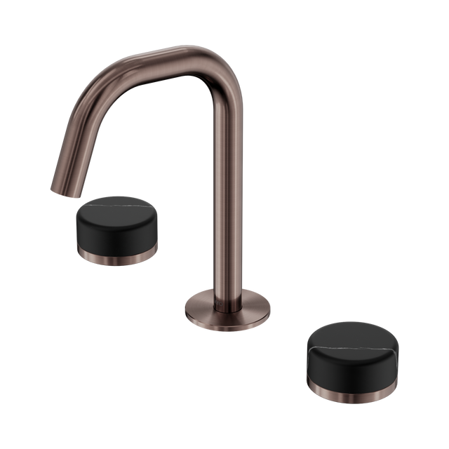 An image of Nero Tapware's Serenity Basin Set Edge Spout With Marquina Black Handle Brushed Bronze