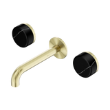 An image of Nero Tapware's Serenity Wall Basin Set 160mm Spout With Marquina Black Handle Brushed Gold