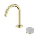 An image of Nero Tapware's Serenity Progressive Basin Mixer Arc Spout With Carrara Handle Brushed Gold
