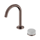 An image of Nero Tapware's Serenity Progressive Basin Mixer Arc Spout With Carrara Handle Brushed Bronze