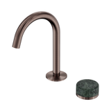 An image of Nero Tapware's Serenity Progressive Basin Mixer Arc Spout With Verde Alpi Handle Brushed Bronze