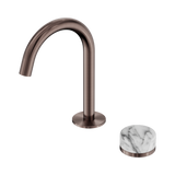 An image of Nero Tapware's Serenity Progressive Basin Mixer Arc Spout With Arabescato Corchia Handle Brushed Bronze