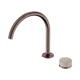 An image of Nero Tapware's Serenity Progressive Bath/Kitchen Mixer Arc Spout With Rome Travertine Handle Brushed Bronze