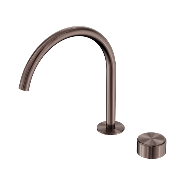 An image of Nero Tapware's Serenity Progressive Bath/Kitchen Mixer Arc Spout With Metal Handle Brushed Bronze