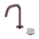 An image of Nero Tapware's Serenity Progressive Basin Mixer Edge Spout With Carrara Handle Brushed Bronze