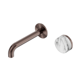 An image of Nero Tapware's Serenity Progressive Wall Basin Mixer 160mm Spout With Arabescato Corchia Handle Brushed Bronze