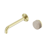 An image of Nero Tapware's Serenity Progressive Wall Basin Mixer 185mm Spout With Rome Travertine Handle Brushed Gold
