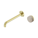 An image of Nero Tapware's Serenity Progressive Wall Basin Mixer 220mm Spout With Rome Travertine Handle Brushed Gold
