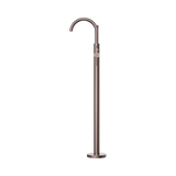 An image of Nero Tapware Mecca Round Freestanding Mixer With Hand Shower Brushed Bronze