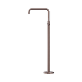 An image of Nero Tapware Mecca Freestanding Bath Mixer Square Shape Brushed Bronze
