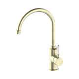 An image of Nero Tapware York Kitchen Mixer Gooseneck Spout With White Porcelain Lever Aged Brass