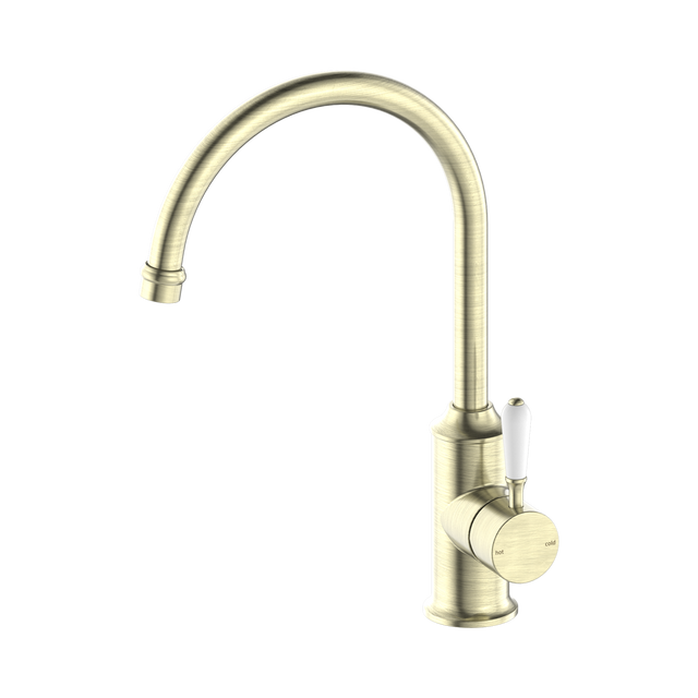 An image of Nero Tapware York Kitchen Mixer Gooseneck Spout With White Porcelain Lever Aged Brass