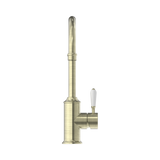 An image of Nero Tapware York Kitchen Mixer Gooseneck Spout With White Porcelain Lever Aged Brass