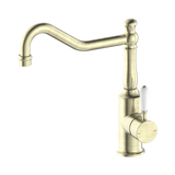 An image of Nero Tapware York Kitchen Mixer Hook Spout With White Porcelain Lever Aged Brass