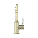An image of Nero Tapware York Kitchen Mixer Hook Spout With White Porcelain Lever Aged Brass