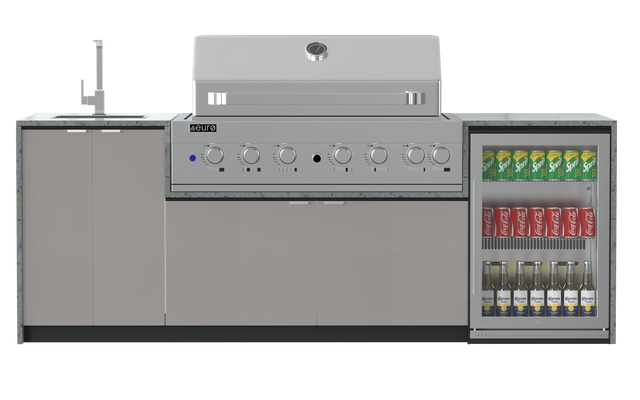 An outdoor kitchen with beige coloured cabinets and stainless steel appliances